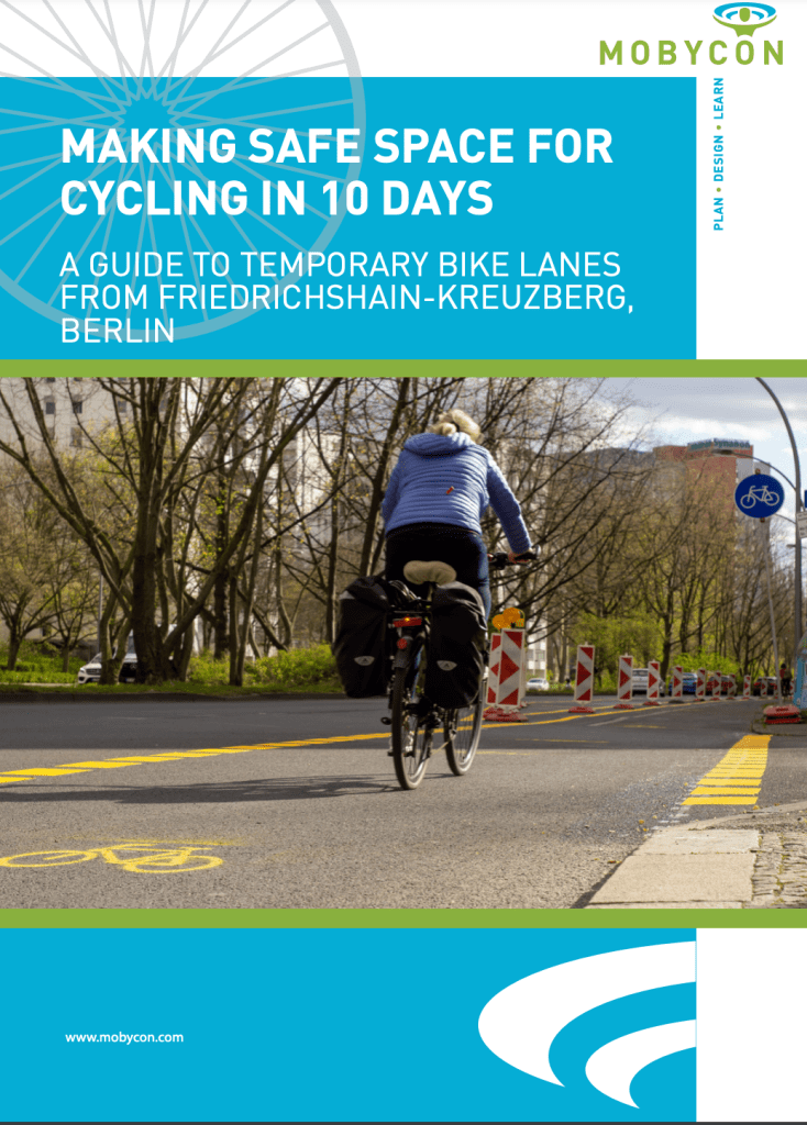 Cover of Mobycon’s guide ‘Making Safe Space for Cycling in 10 Days’, on temporary Berlin bike lanes, showing a cyclist