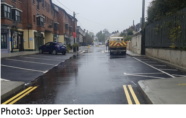 Photo 3, Upper Section of Cleamore Road with perpendicular car parking on both sides and no cycle provision
