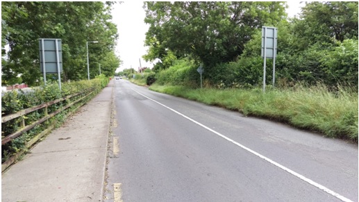 The Celbridge Road in Maynooth: a wide grassy verge beside the carriageway showing space for a cycle path