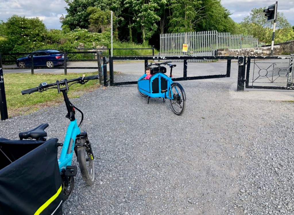 A pair of cargo bikes obstructed by a kissing gate at Deey Bridge (Lock 13) on the Royal Canal